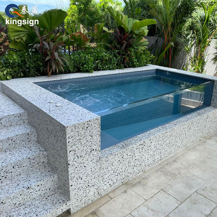 How do acrylic windows contribute to the aesthetics of a spa pool area?